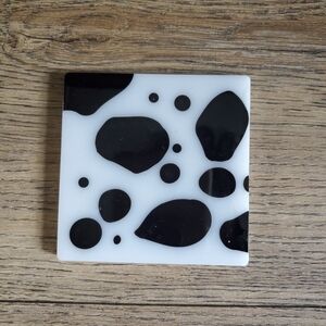 Cowhide print epoxy resin coaster.  Handmade black and white.
